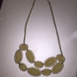 Cute cream colored necklace never used!